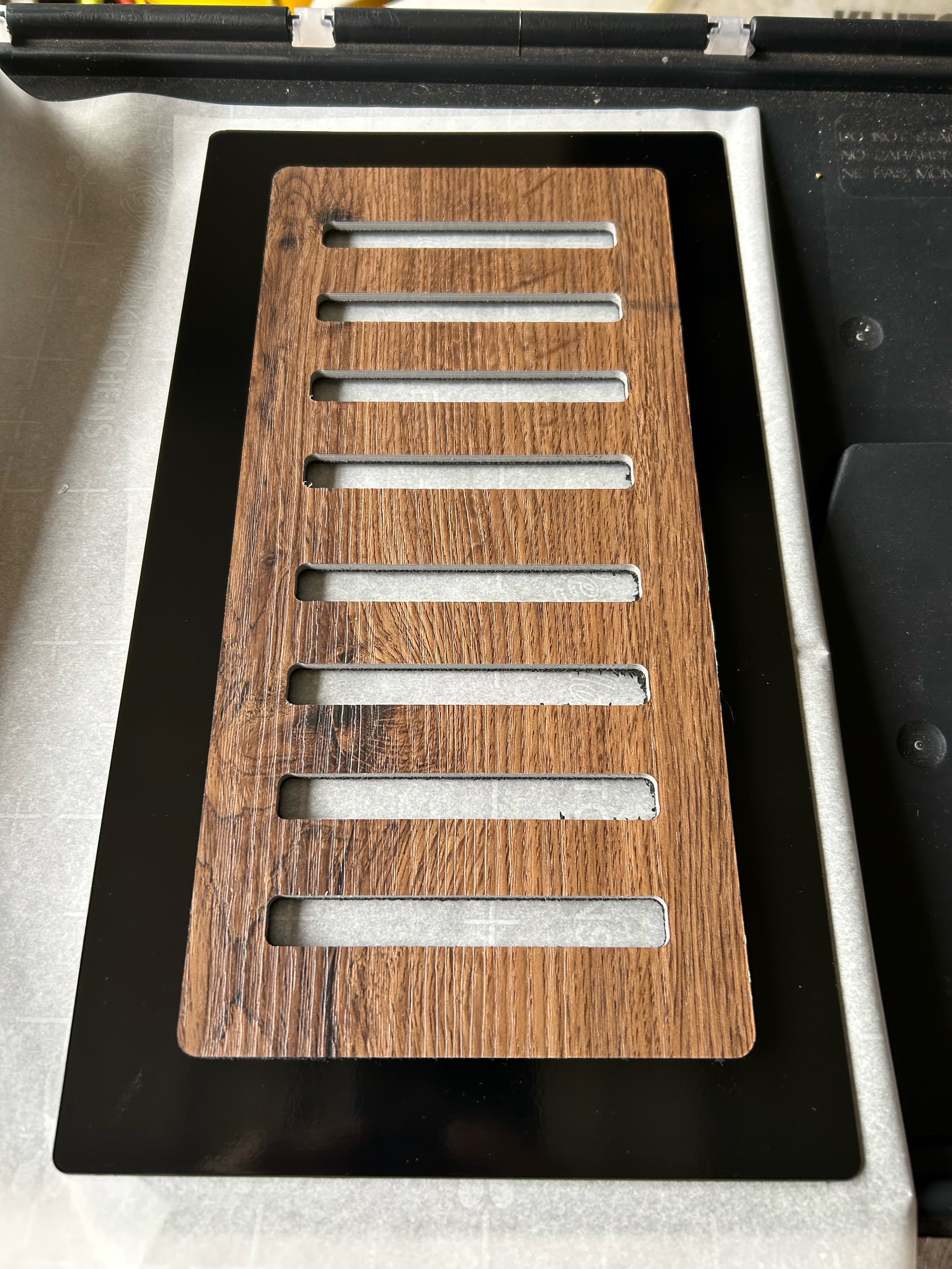 Custom CNC flush mount LVP floor vent with hidden steel frame manufactured in Clayton NC