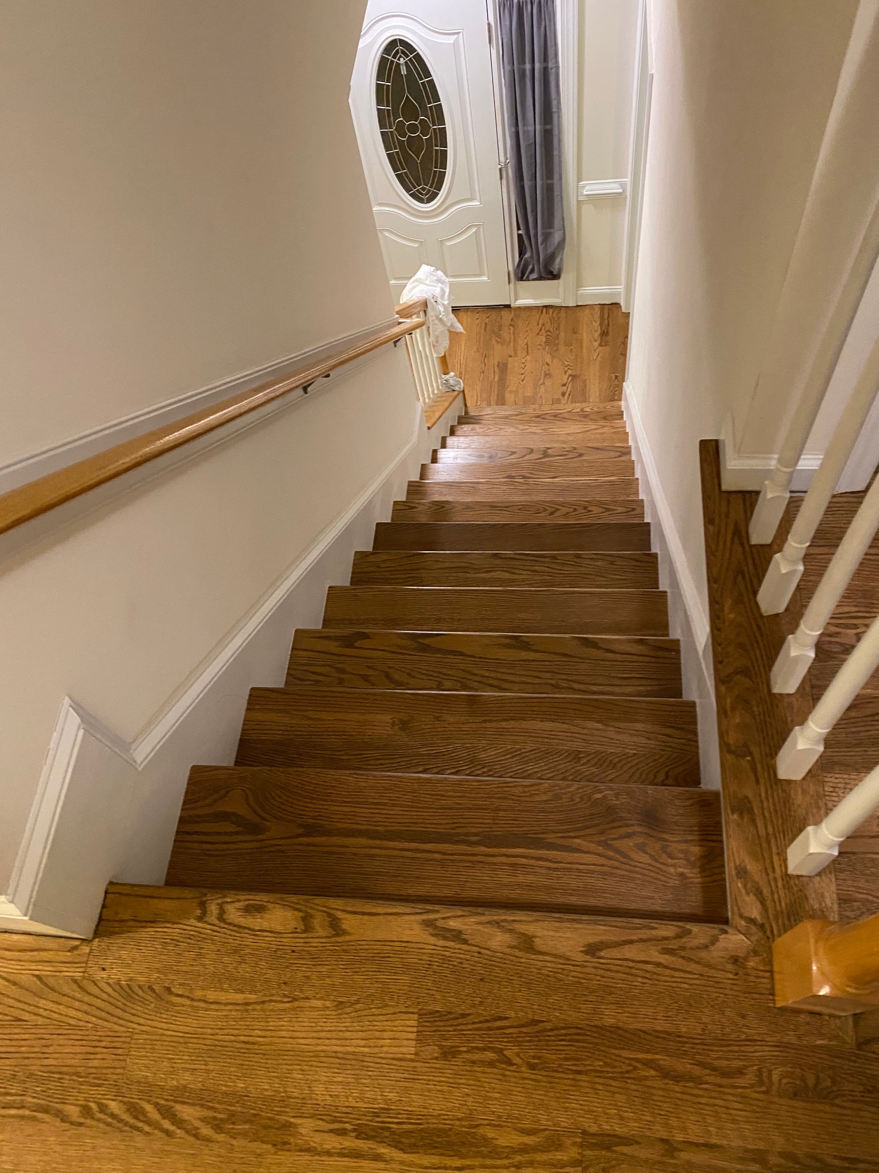 red oak staircase remodeling finished entryway view Clayton NC