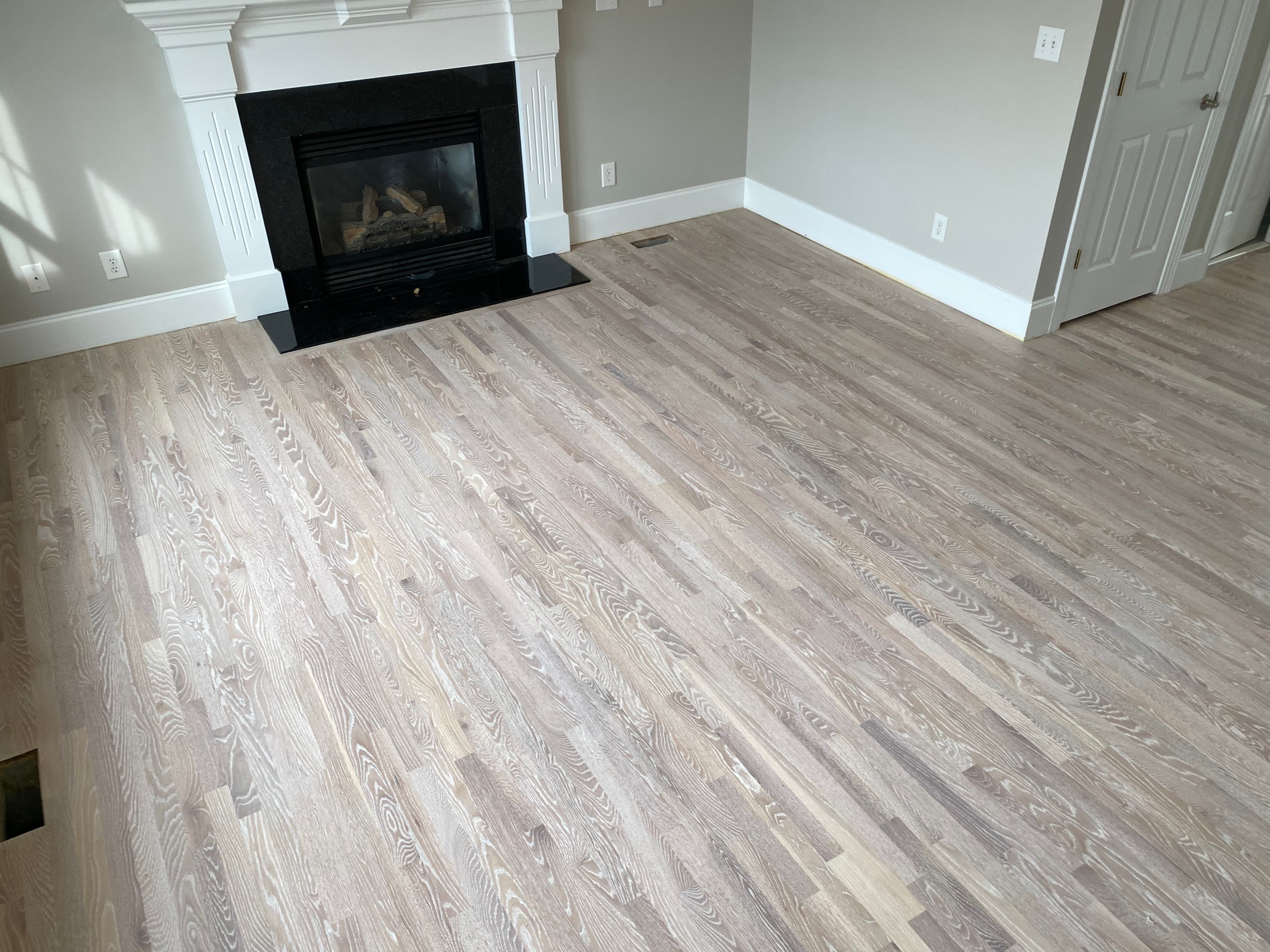 White oak hardwood floors finished with Bona Craft Oil Frost in Wake Forest NC home by 12th And Oak Floor Co.